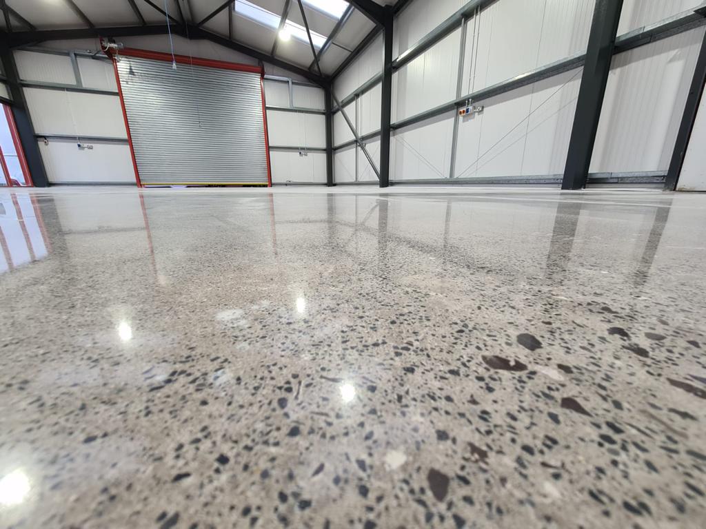 a non-slip industrial concrete floor which has been treated after a spill