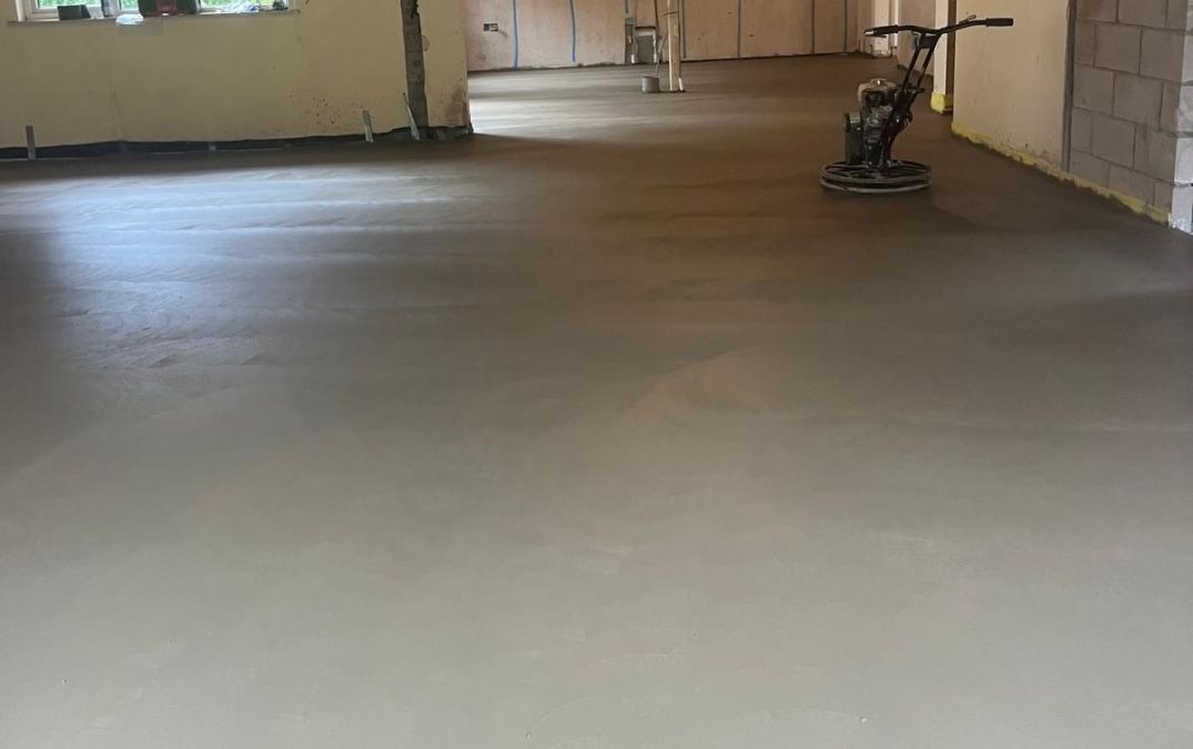 Power floated finish for a concrete floor.