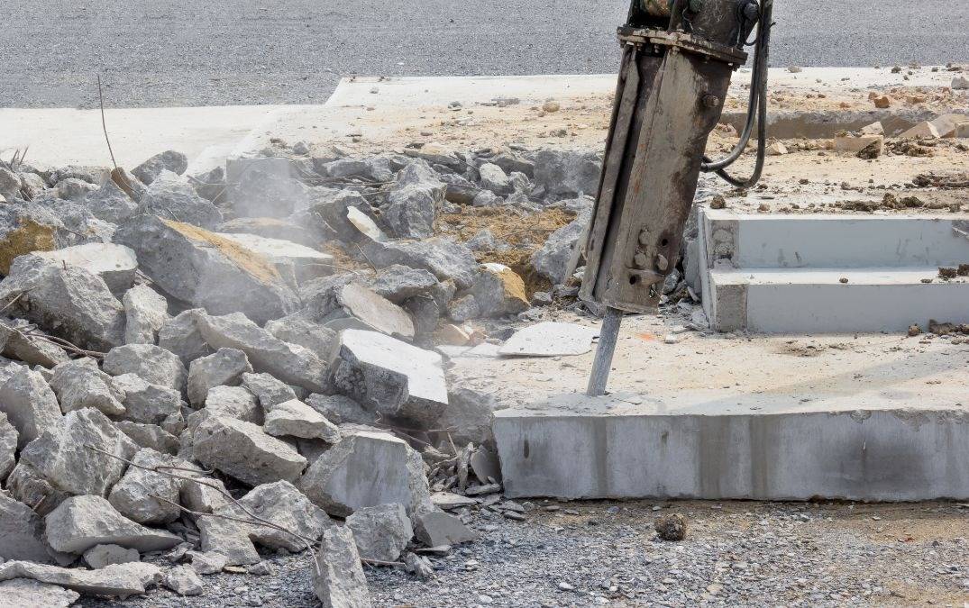 Jackhammer being used to remove concrete flooring