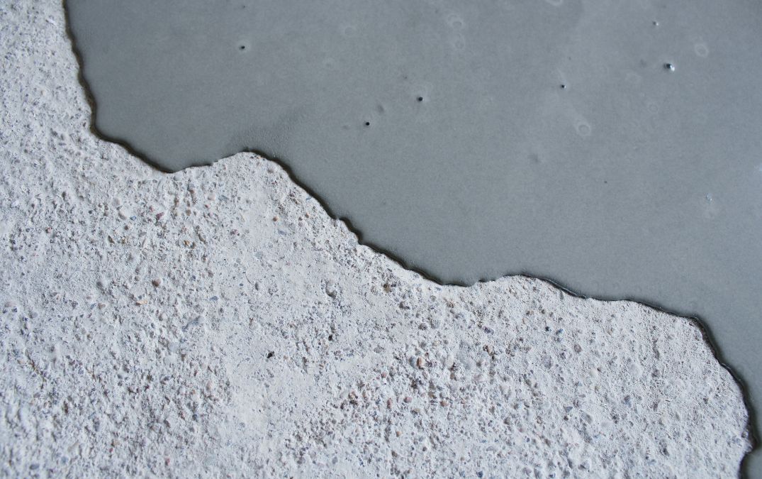 A concrete floor having an epoxy coating over the top.