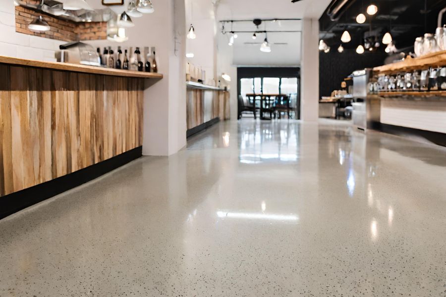 A coffee bar with a salt and pepper polished concrete floor in Gloucester