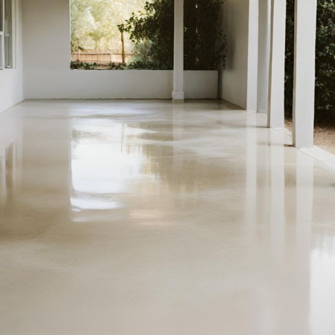 An outside porch with a polished concrete floor