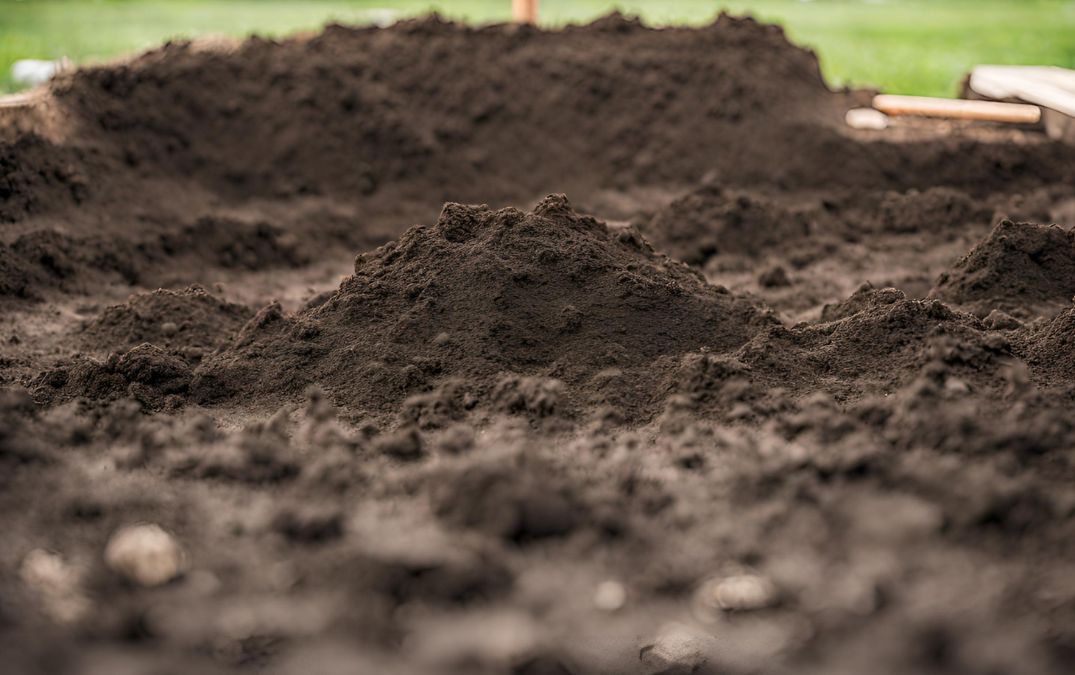 Compacted soil as preperation for laying concrete flooring