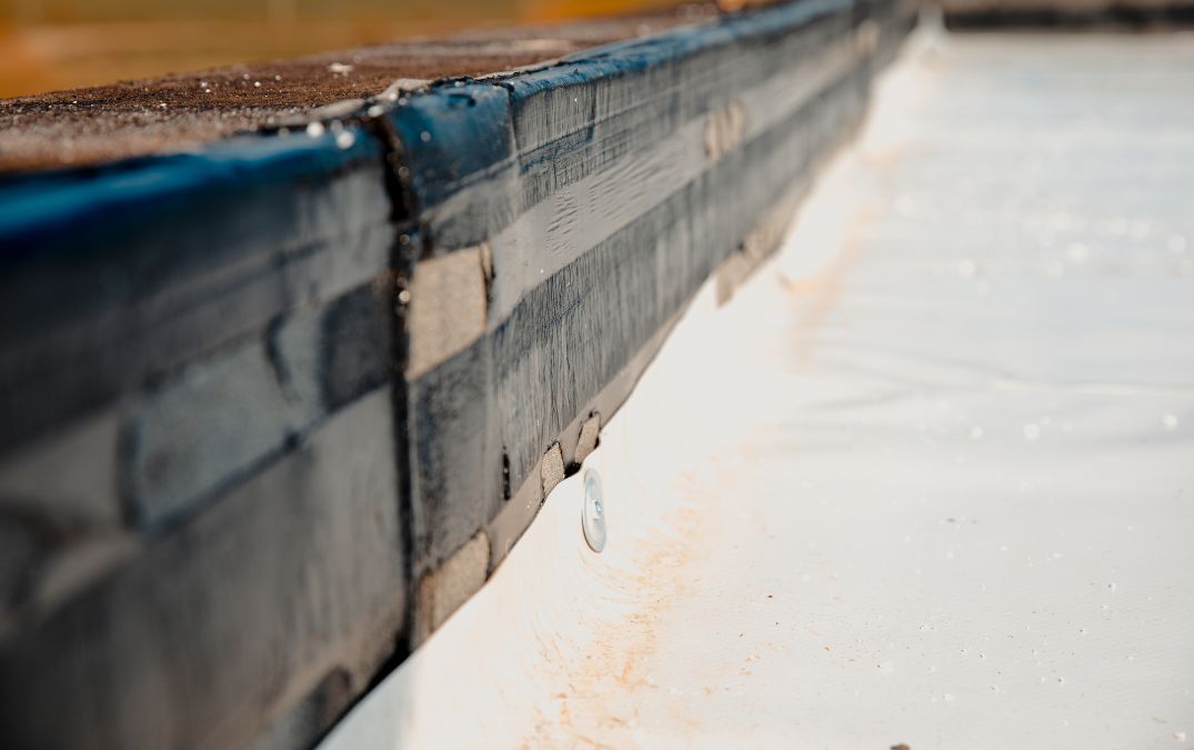 A vapour barrier laid over the top of a foundation set for concrete.