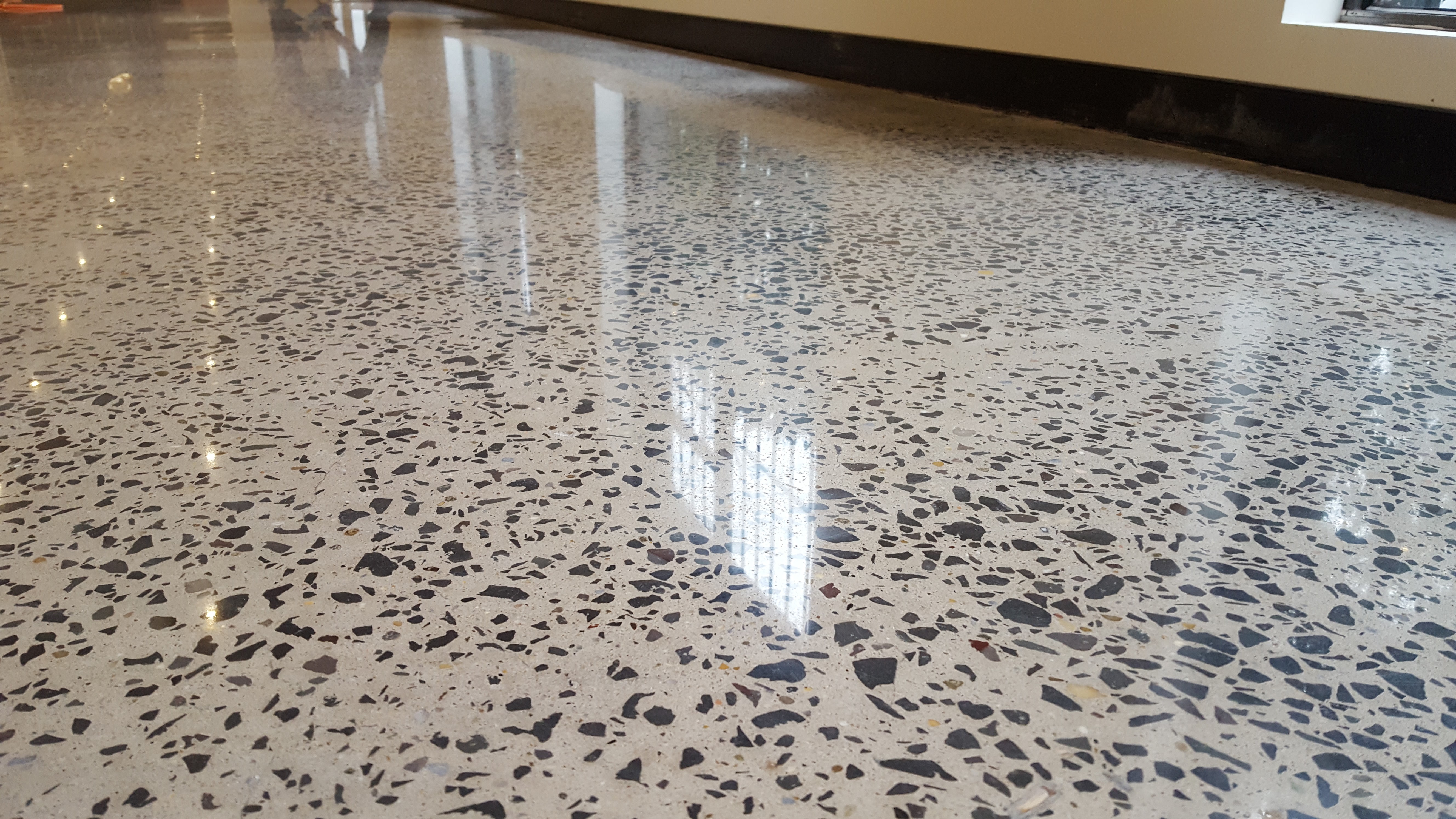 salt and pepper finish on concrete flooring