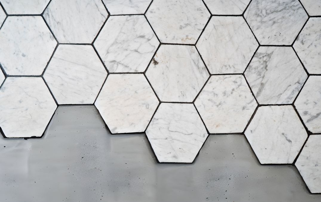 Hexagon peel and stick tiles on concrete flooring