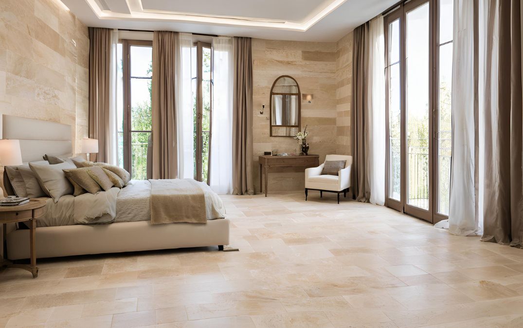 Travertine tile flooring for a bedroom.