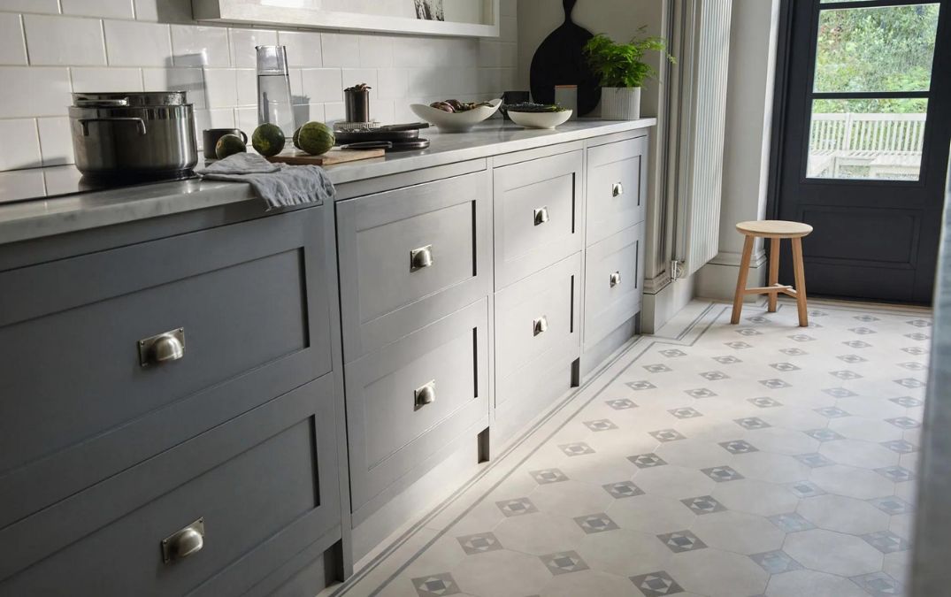 Tile style amtico flooring in a kitchen.